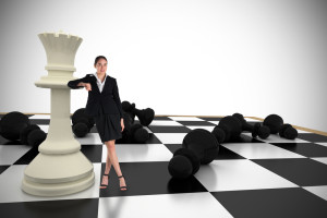 business woman on chess board